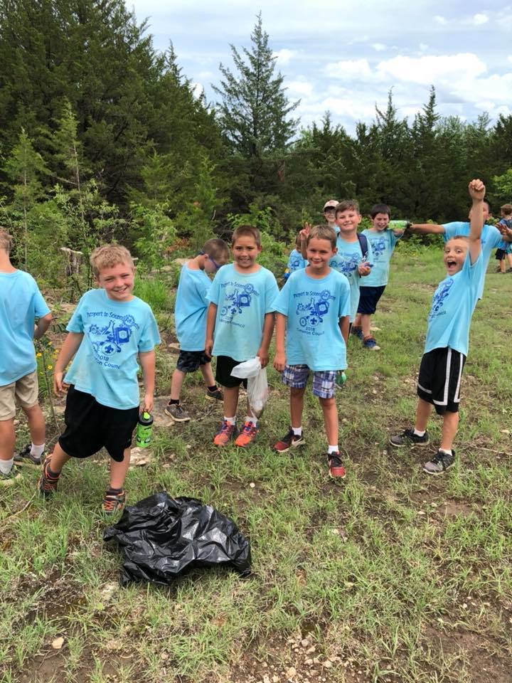 Scouts participating in conservation activities
